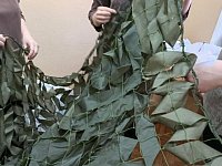 Волонтёры плетут маскировочные сети для участников СВО